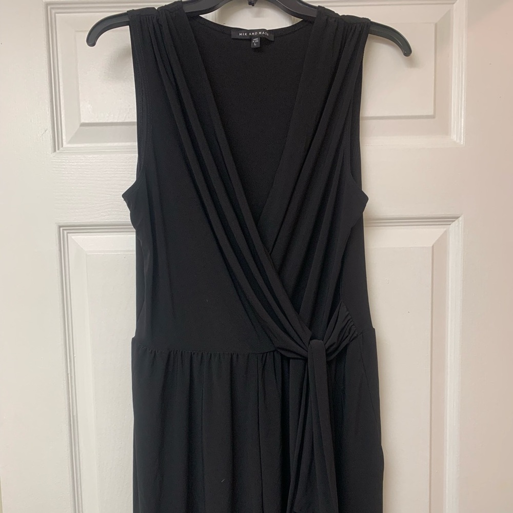 Dressy black romper (shorts) size (L) Worn once.
